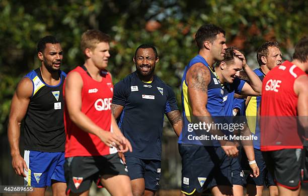 Roy Asotasi of the Warrington Wolves looks on during a Sydney Swans AFL pre-season training session at Lakeside Oval on January 15, 2014 in Sydney,...