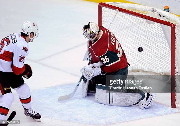 Clarke MacArthur of the Ottawa Senators scores a goal against Darcy Kuemper of the Minnesota Wild during the first period of the game on January 14,...
