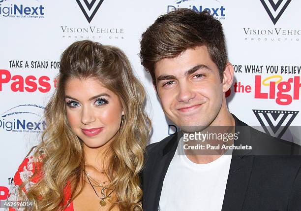Actors Allie Deberry and Cameron Palatas attend the premiere of "Pass The Light" at ArcLight Cinemas on February 2, 2015 in Hollywood, California.