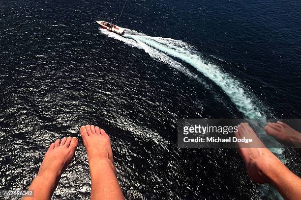 View is seen from up high in the shy as tourists parasail above Nusa Dua Beach on December 30, 2014 in Nusa Dua, Bali, Indonesia.