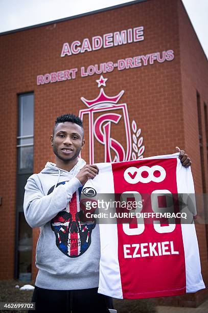 Standard's new player Imoh Ezekiel poses after his official presentation on February 3 in Liege. Nigerian forward Imoh Ezekiel is on loan from Qatari...