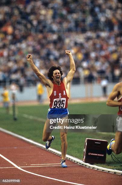 Summer Olympics: USA Bruce Jenner in action and victorious while crossing finish line during 1500M of Decathlon at Olympic Stadium. Montreal, Canada...