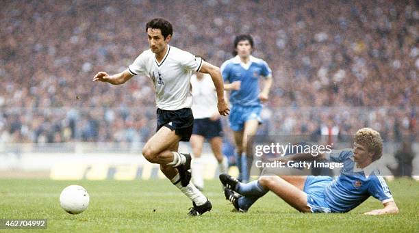 Spurs player Osvaldo Ardiles skips the challenge of Man City defender Tommy Caton during the 1981 FA Cup Final replay between Tottenham Hotspur and...