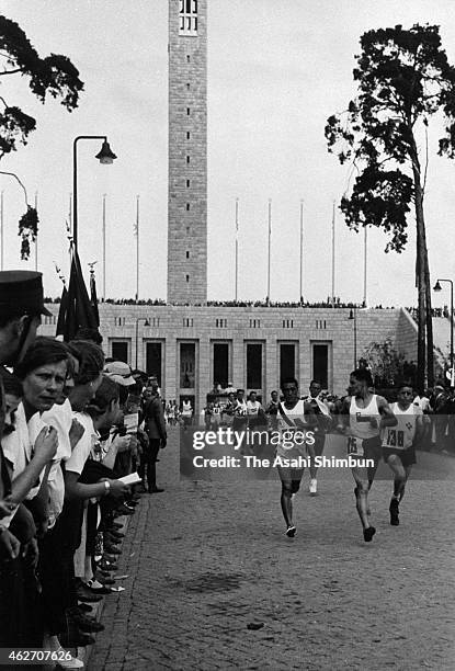 Korean athlete Sohn Kee-chung, competes in the Men's Marathon during the Berlin Olympic at Olympic Stadium on August 9, 1936 in Berlin, Germany.