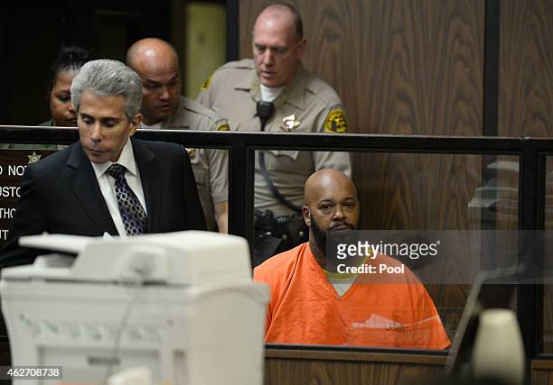 Marian "Suge" Kinght and his Lawyer David E Kenner appear at his arraignmet at Compton Courthouse on February 3, 2015 in Compton, California. Knight...