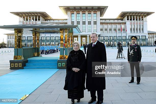 Turkish President Recep Tayyip Erdogan and his wife Emine Erdogan wait to welcome Malian President Ibrahim Boubacar Keita, as Turkish Presidential...