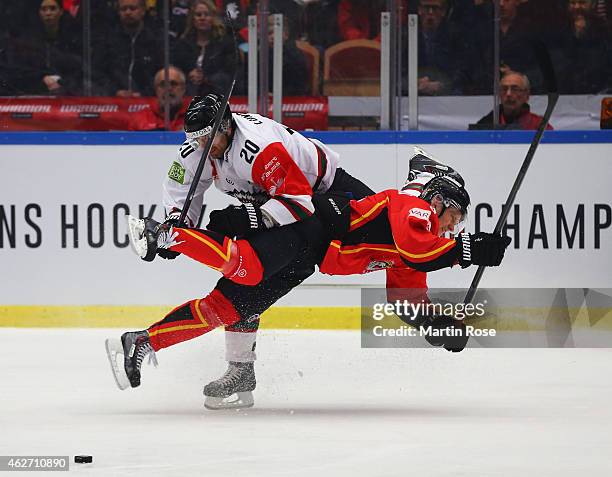 Joel Lundqvist of Frolunda Gothenburg challenges Marcus Fagerudd of Lulea Hockey during the Champions Hockey League Final match between Lulea Hockey...