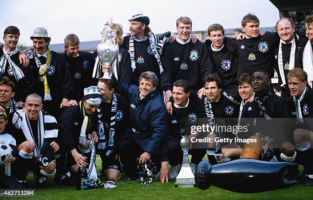 Newcastle United manager Kevin Keegan holds the League Division One trophy after the League Division One match against Leicester City at St James'...