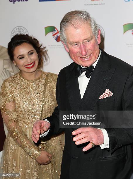 Prince Charles, Prince of Wales shares a joke with Indian actress Rani Mukerji as they attend the British Asian Trust dinner at Banqueting House on...