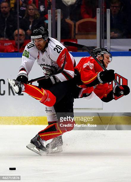 Marcus Fagerudd of Lulea is checked by Joel Lundqvist of Gothenburg during the Champions Hockey League final match at Coop Norrbotten Arena on...