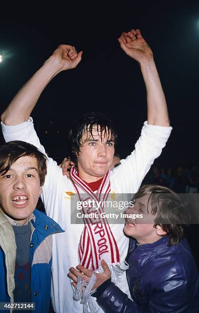 Liverpool player Alan Hansen celebrates with some young fans after scoring the winning goal in the 1981 League Cup Final replay against West Ham...