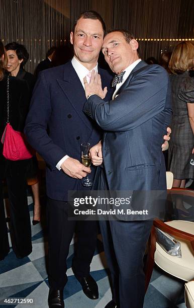 Dominic West and AA Gill attend a charity dinner hosted by Nicola Formby and AA Gill with Dana Hoegh in support of Borne, a charity aimed at...