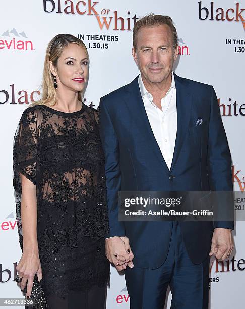 Actor Kevin Costner and wife Christine Baumgartner attend the premiere of 'Black or White' at Regal Cinemas L.A. Live on January 20, 2015 in Los...