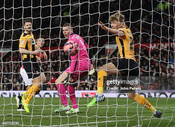 Marcos Rojo of Manchester United scores their second goal during the FA Cup Fourth Round replay between Manchester United and Cambridge United at Old...