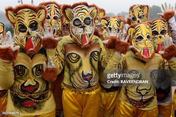 Indian school children perform a Pulikali during a rehearsal for the Indian Republic Day parade in New Delhi on January 15, 2014. India will...