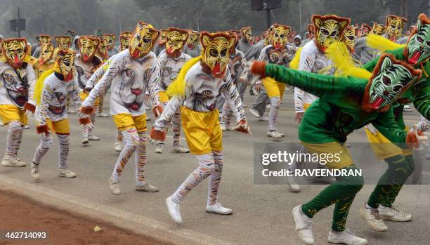 Indian school children perform a Pulikali during a rehearsal for the Indian Republic Day parade in New Delhi on January 15, 2014. India will...