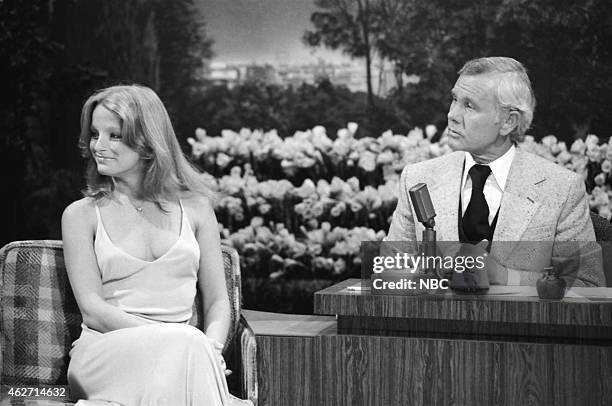 Pictured: Model Claudia Jennings during an interview with host Johnny Carson on March 29, 1978 --