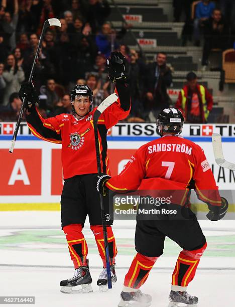 Dean Kukan of Lulea Hockey celebrates scoring his team's fourth goal with Jan Sandstrom during the Champions Hockey League Final match between Lulea...