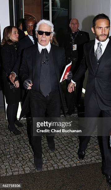 Karl Lagerfeld sighted leaving the 'Corsa Karl Und Choupette' Vernissage event on February 3, 2015 in Berlin, Germany.