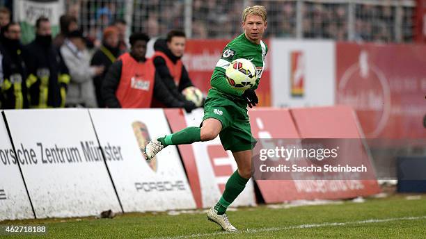 Kevin Schoeneberg of Muenster controls the ball during the 3. Liga match between Preussen Muenster and Dynamo Dresden at Preussenstadion on February...