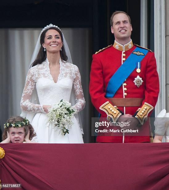 Catherine, Duchess of Cambridge and Prince William, Duke of Cambridge on the balcony at Buckingham Palace with Bridesmaid Grace Van Cutsem, following...