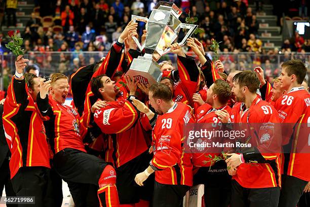 Lulea Hockey players celebrate victory with the trophy after the Champions Hockey League final match at Coop Norrbotten Arena on February 3, 2015 in...