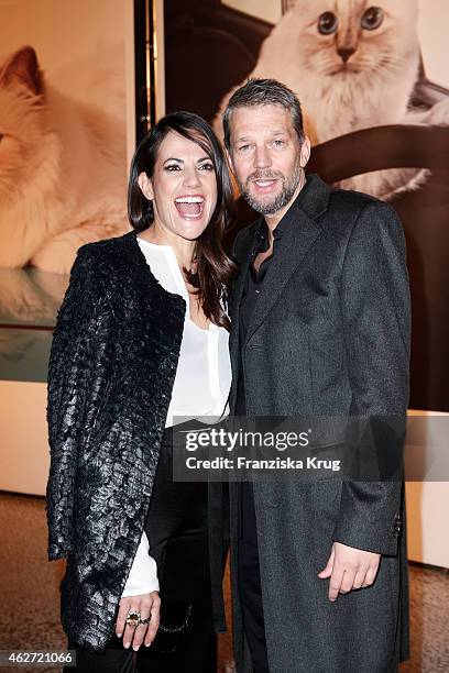 Bettina Zimmermann and Kai Wiesinger attend the 'Corsa Karl Und Choupette' Vernissage on February 03, 2015 in Berlin, Germany.