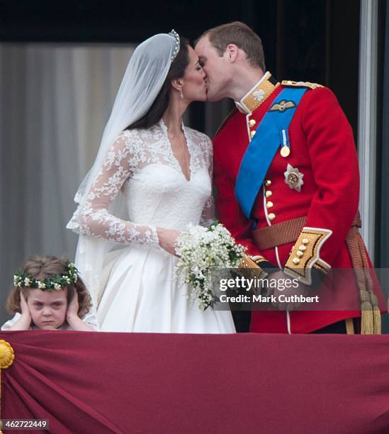 Catherine, Duchess of Cambridge and Prince William, Duke of Cambridge on the balcony at Buckingham Palace with Bridesmaid Grace Van Cutsem, following...