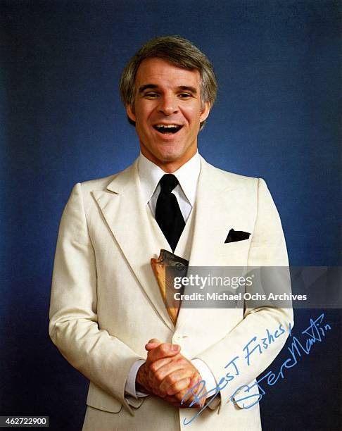 Comedian Steve Martin poses for a portrait with a fish tucked in to his 3 piece suit and signed "Best Fishes, Steve Martin" to publicize the release...