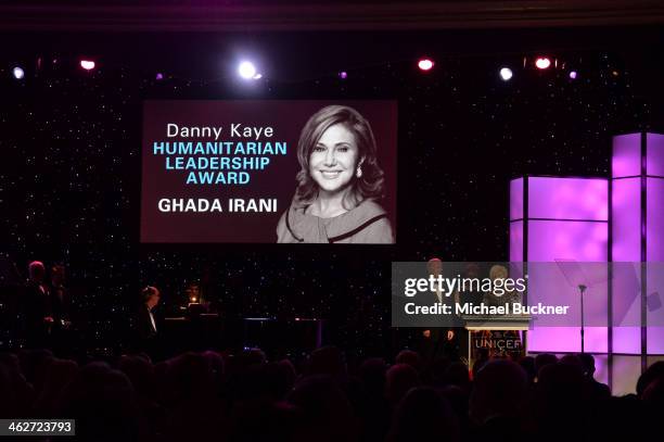 Presenter James Baker, Caryl Stern, President & CEO U.S. Fund for UNICEF and Danny Kaye Humanitarian Leadership Award recipient Ghada Irani speak...