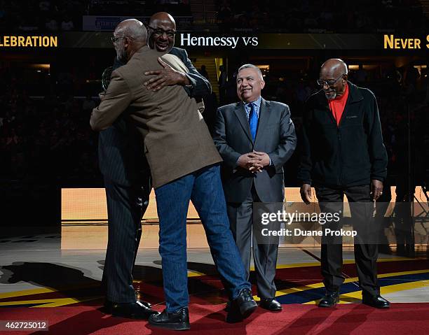 John Carlos, left, Campy Russell, Manny Gonzalez, and Harrison Dillard attends the Hennessy V.S and Cleveland Cavaliers event honoring Olympian...