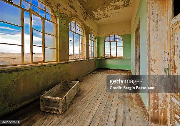 Kolmanskop, Namibia - Interior of an abandoned building. Kolmanskop is a ghost town in the Namib desert in southern Namibia, a few kilometres inland...