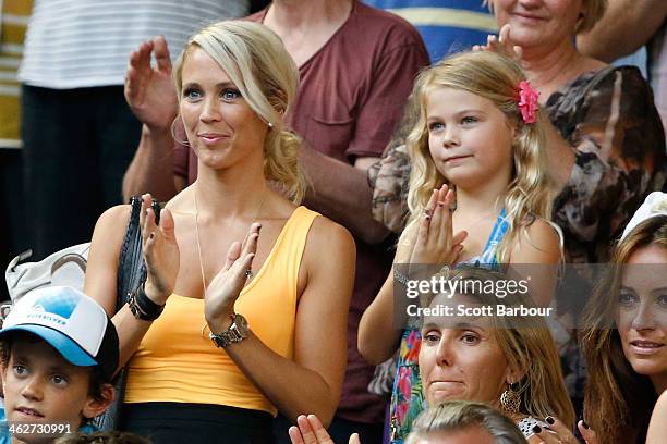 Bec Hewitt watches Patrick Rafter of Australia and Lleyton Hewitt of Australia in their first round doubles match against Eric Butorac of the United...