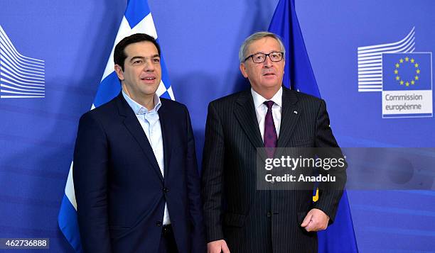 Greek Prime Minister Alexis Tsipras meets European Commission President Jean-Claude Juncker at the European Commission headquarters in Brussels on...