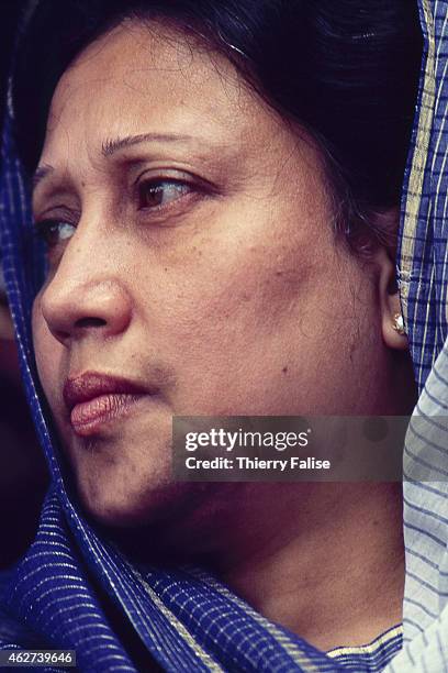 Bangladesh prime minister Khaleda Zia visits an area of her country devastated by a cyclone in 1991.