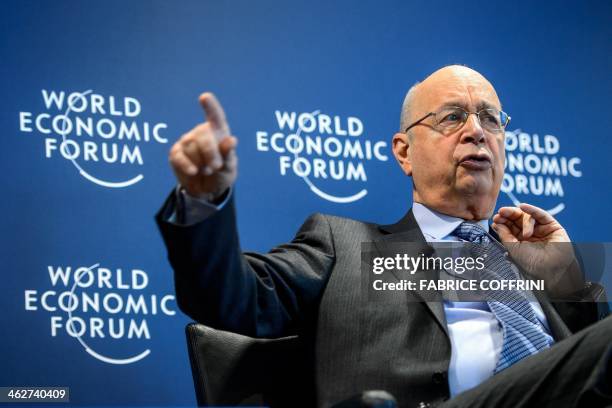 World Economic Forum founder and executive chairman Klaus Schwab gestures during a news conference focused World Economic Forum WEF annual meeting at...