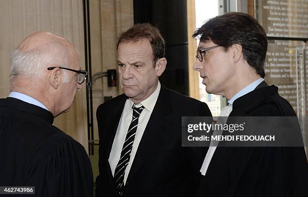 French photographer Francois-Marie Banier , former confidant of Liliane Bettencourt, speaks with his lawyer Laurent Merlet and Pierre Cornut-Gentille...