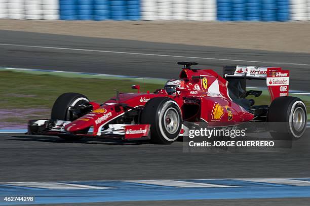 Ferrari's Finnish driver Kimi Raikkonen drives on the fourth day of the Formula One pre-season tests at Jerez racetrack in Jerez on February 4, 2015....