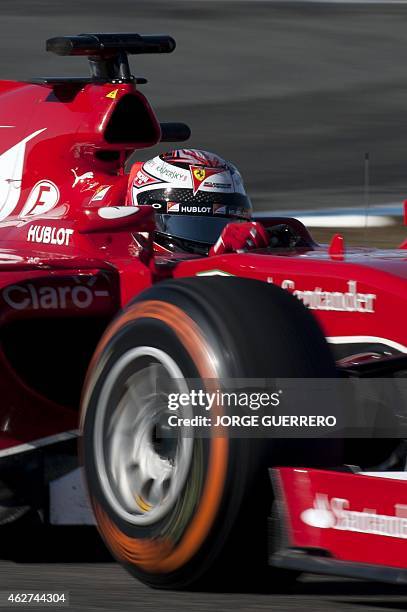 Ferrari's Finnish driver Kimi Raikkonen drives on the fourth day of the Formula One pre-season tests at Jerez racetrack in Jerez on February 4, 2015....