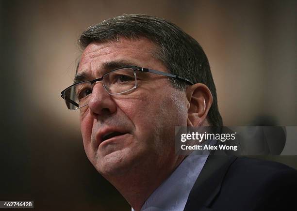 Former U.S. Deputy Secretary of Defense Ashton Carter testifies during his confirmation hearing before the Senate Armed Services Committee February...