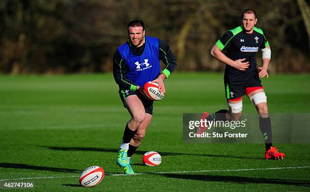 Wales player Jamie Roberts runs with the ball during the Wales open training session ahead of friday's 6 Nations match against England at the Vale...