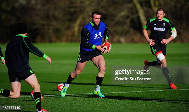 Wales player Jamie Roberts runs with the ball during the Wales open training session ahead of friday's 6 Nations match against England at the Vale...