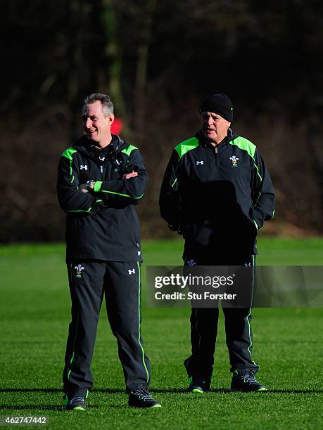 Wales coach Warren Gatland and his assistant Robert Howley chat during the Wales open training session ahead of friday's 6 Nations match against...