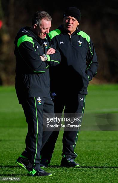 Wales coach Warren Gatland and his assistant Robert Howley chat during the Wales open training session ahead of friday's 6 Nations match against...
