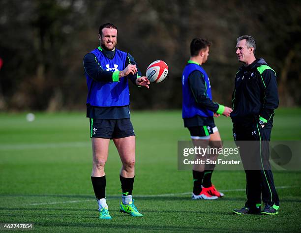 Wales player Jamie Roberts shares a joke with Robert Howley during the Wales open training session ahead of friday's Six Nations match against...