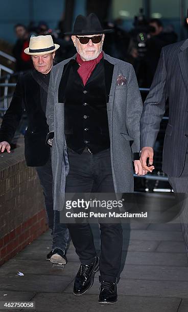 Gary Glitter, real name Paul Gadd, leaves Southwark Crown Court after the jury retired to consider their verdict on February 4, 2015 in London,...