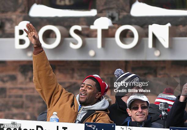 Malcolm Butler of the New England Patriots waves to fans during a Super Bowl victory parade on February 4, 2015 in Boston, Massachusetts. The...