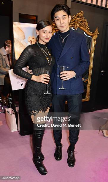 Leah Weller and Tomo Kurata attend the launch of the Pretty Ballerinas SS15 collection hosted by the face of the campaign Zara Martin at their Covent...