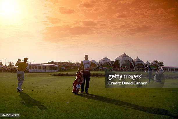 Ronan Rafferty of Northern Ireland plays his third shot at the par 5, 18th hole watched by his playing partner Severiano Ballesteros of Spain the...