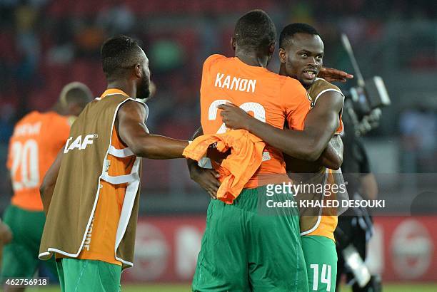 Ivory Coast's midfielder Ismael Diomande celebrates with teammates at the end of the 2015 African Cup of Nations semi-final football match between...
